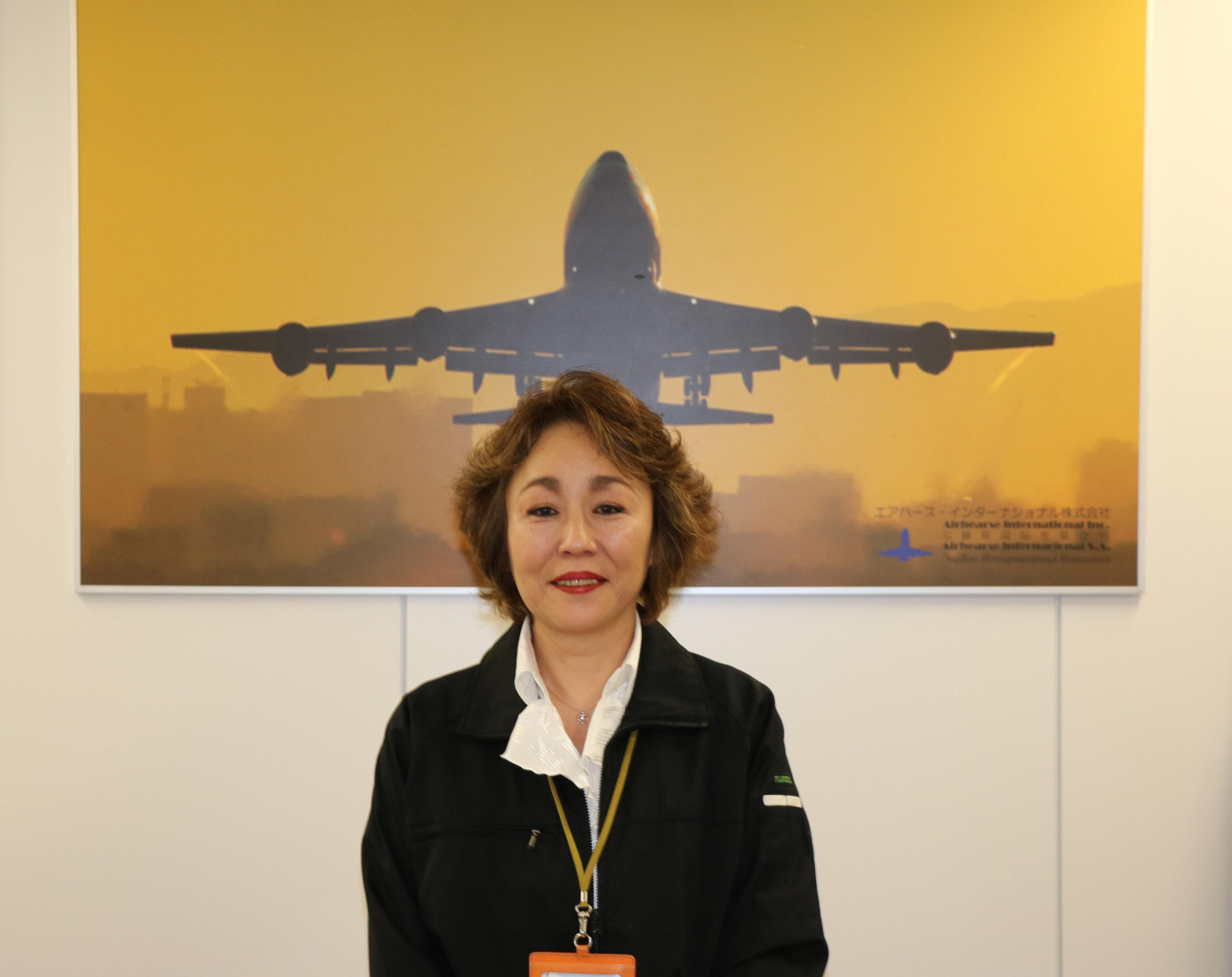 Airhearse International Inc. President Rie Kimura, who heads a six-person operation that handles the international repatriation of human remains, poses for a photo Oct. 23 in Tokyo. | KYODO