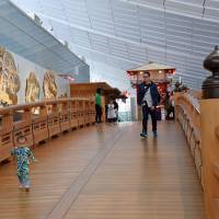 The re-created wooden Nihonbashi Bridge from the Edo Period is among the features at Haneda\'s international terminal. | SATOKO KAWASAKI