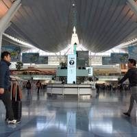 Thousands of travelers flow through the international departure lobby at Haneda every day. | SATOKO KAWASAKI