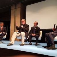 Former White House chief strategist Steve Bannon participate in a panel discussion in Tokyo on Sunday. | TOMOHIRO OSAKI