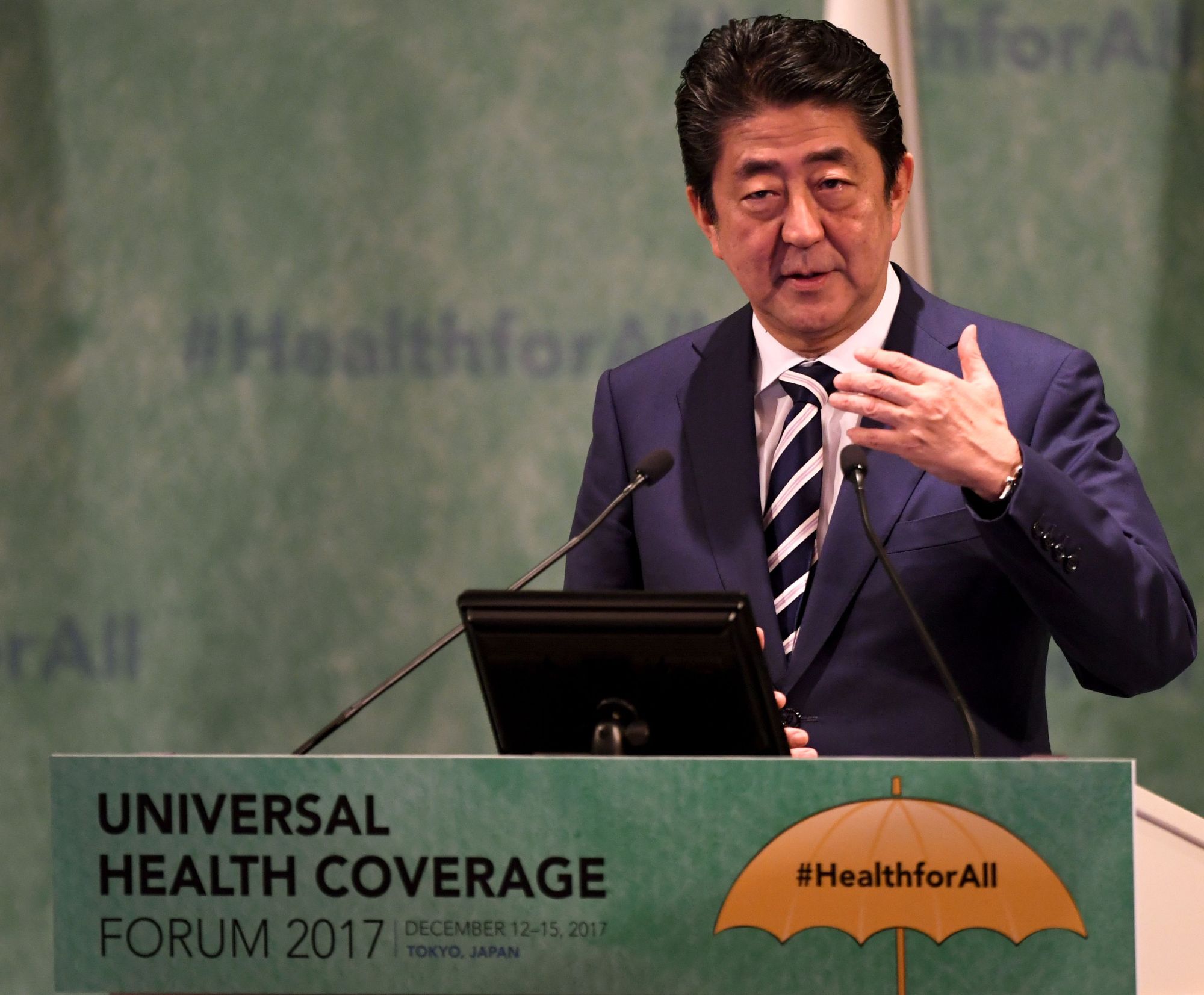 Prime Minister Shinzo Abe delivers an opening speech at the Universal Health Coverage Forum, on Dec. 14 in Tokyo. | AFP-JIJI