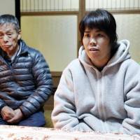 Mika Nishiyama, a former hospital worker who is seeking a retrial after she was found guilty of causing the death of a patient, speaks to the media in Shiga Prefecture on Monday. | KYODO