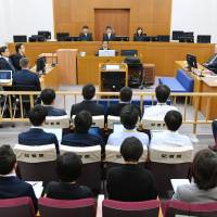 A courtroom at the Naha District Court is seen on Dec. 1, when former U.S. base worker Kenneth Franklin Shinzato was sentenced to life in prison for the rape and murder of a 20-year-old woman. | POOL / VIA KYODO