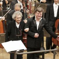 Plead the ninth: Conductor Seiji Ozawa is aided by Czech musician Radek Baborak at a performance of Beethoven\'s Symphony No. 9 by the Mito Chamber Orchestra on Oct. 15. | MICHIHARU OKUBO