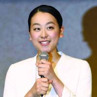 Skating off: Mao Asada speaks to the press after announcing her retirement on her blog in April. | KYODO