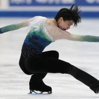 The iceman cometh: Yuzuru Hanyu skates at the world championships in Helsinki in April. | AP