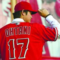 In demand: No. 17 Shohei Ohtani is introduced to fans during a press conference at Anaheim Stadium earlier this month. | JAYNE KAMIN-ONCEA / USA TODAY SPORTS / VIA REUTERS