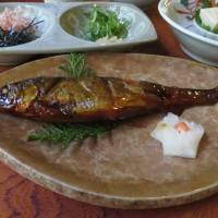 A tofu lunch course includes fish and other delectables, enjoyed at a restaurant overlooking the Kibune River. | AMY CHAVEZ