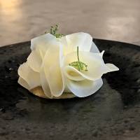 Delicate \"flowers\" of crisp potato on savory sable cookies, with caviar from Kagawa Prefecture | ROBBIE SWINNERTON