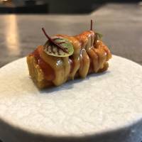 Carrot churros topped with uni (sea urchin) | ROBBIE SWINNERTON