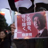 Gamble pays off:  The threat of nuclear attack by North Korea and disarray among the opposition  helped Shinzo Abe and his Liberal Democratic Party  clinch victory in the snap Lower House election in October. | BLOOMBERG