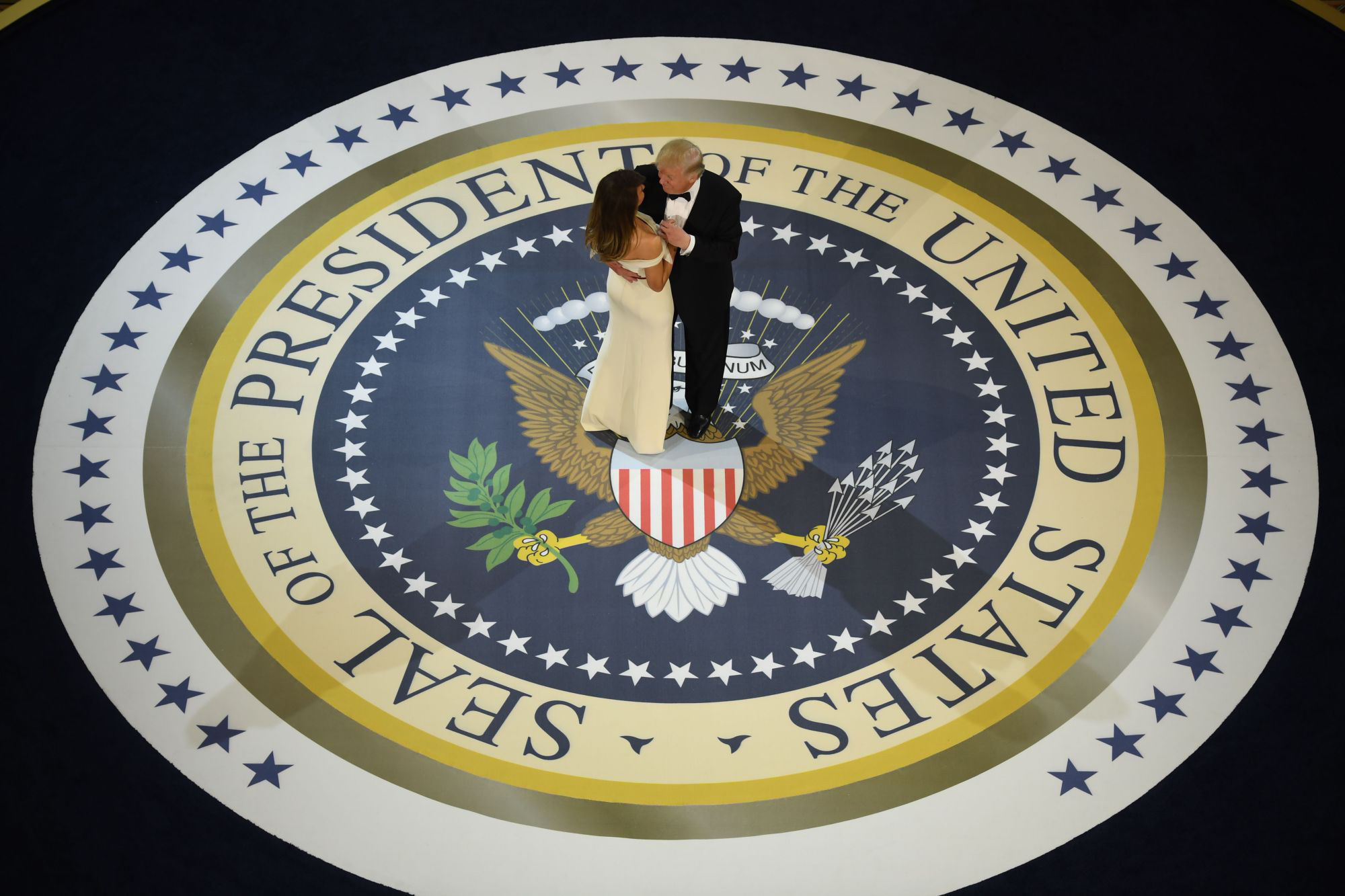 First dance: U.S. President Donald Trump and first lady Melania Trump dance at the Armed Services Ball after his inauguration as the 45th president of the United States in January. | AFP-JIJI