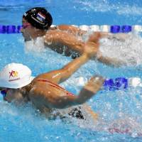 Rikako Ikee (front), seen competing in the women\'s 50-meter butterfly at the Swim Cup Lausanne on Wednesday,  finished runner-up in the women\'s 50 freestyle a day later at the same two-day meet. | KYODO