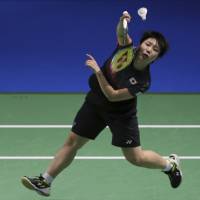 Ayane Yamaguchi plays a shot during her World Super Series Finals match against India\'s Pusarla V Sindhu in Dubai, United Arab Emirates, on Sunday. | AP