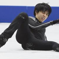 Yuzuru Hanyu falls while attempting a quad lutz during practice ahead of the NHK Trophy on Nov. 9. Hanyu was injured in the fall and hasn\'t competed since. The Japan Skating Federation announced Monday that Hanyu will miss the national championships because of the injury. | KYODO