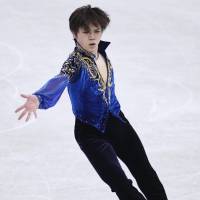 Shoma Uno performs his free skate routine at the Grand Prix Final on Friday night. Uno placed second in the men\'s two-day event with 286.01 points. | KYODO