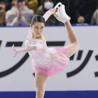 Satoko Miyahara skates in the women\'s short program at the national championships on Thursday night. Miyahara is in second place with 73.23 points. | KYODO