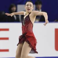 Rika Hongo competes in the women\'s short program on Thursday. Hongo is in third place with 70.48 points. | KYODO