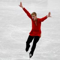 Alexei Krasnozhon is in first place after receiving 81.33 points in the men\'s short program in the Junior Grand Prix Final on Thursday. | REUTERS