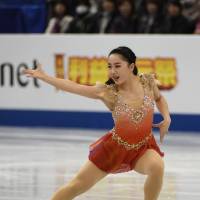 Wakaba Higuchi skates in the women\'s short program. She sits in fifth place with 73.26 points. | AFP-JIJI