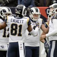 Rams wide receiver Cooper Kupp and his teammates beat the Titans 27-23 on Christmas Eve, improving to 11-4. | AP