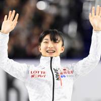 Kaori Sakamoto waves to the crowd after being chosen as a member of Japan\'s figure skating team for the 2018 Pyeongchang Olympics following the national championships in Tokyo on Sunday night. | KYODO