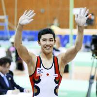 Kenzo Shirai waves to the crowd during the Toyota International Gymnastics Competition on Sunday. | KYODO