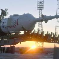 A Russian Soyuz spacecraft that will carry astronauts Norishige Kanai of Japan, Scott Tingle of the United States and Anton Shkaplerov of Russia      to the International Space Station is moved to the launch pad on Friday morning at the Baikonur Cosmodrome facility in southern Kazakhstan. Liftoff for the mission is scheduled for Sunday. | KYODO
