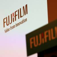 Fujifilm Holdings will cut one-fifth of its global workforce &#8212; 10,000 jobs &#8212; at a joint venture with Xerox as part of a broader reorganization. | REUTERS