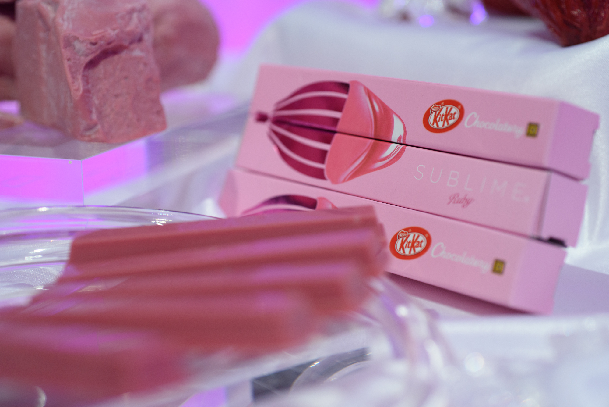 Ruby chocolate KitKats, produced by Nestle SA, are displayed during a media event in Tokyo on Thursday. | BLOOMBERG