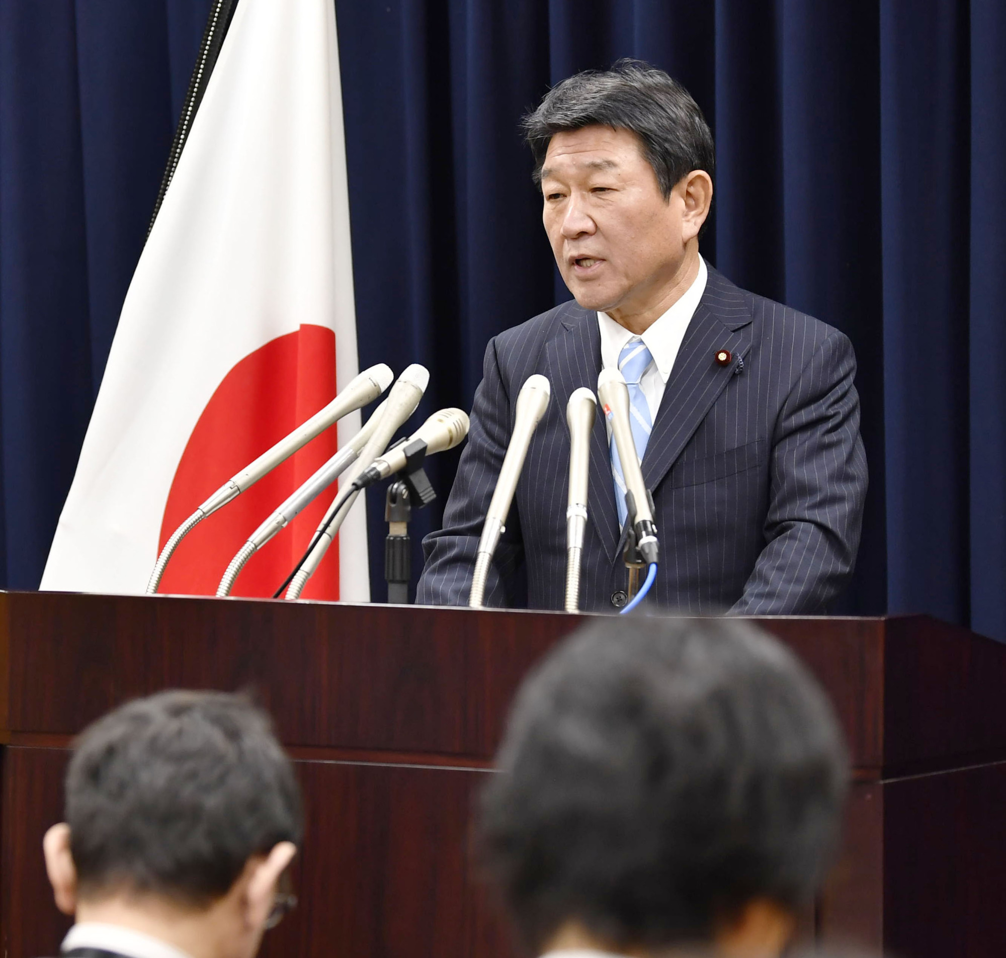 Toshimitsu Motegi, the government's minister in charge of TPP issues, speaks at a news conference on Tuesday in Tokyo. | KYODO