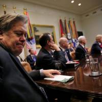 White House chief strategist Stephen Bannon (left) attends a meeting between U.S. President Donald Trump and congressional leaders to discuss trade deals at the at the Roosevelt room of the White House in Washington last Feb. 2. | REUTERS