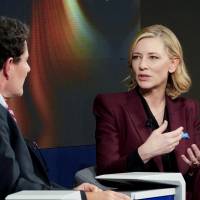 Cate Blanchett, goodwill ambassador, United Nations High Commissioner for Refugees (UNHCR), and Nicholas D. Kristof, columnist for the New York Times, speak during the World Economic Forum (WEF) annual meeting in Davos, Switzerland, Tuesday. | REUTERS