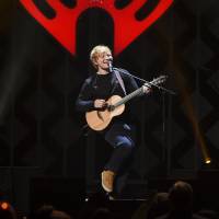 Singer-songwriter Ed Sheeran performs at Z100\'s iHeartRadio Jingle Ball at Madison Square Garden, in New York Dec. 8. Sheeran\'s album \"Divide\" was the most popular album of 2017, helping the music industry enjoy a growth spurt during the year, according to Nielsen Music. | EVAN AGOSTINI / INVISION / VIA AP