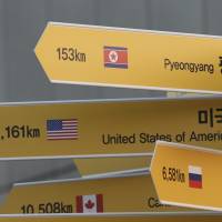 A destination sign to North Korea\'s capital Pyongyang is seen at the Imjingak Pavilion in Paju, South Korea, Wednesday. North Korean leader Kim Jong Un reopened a key cross-border communication channel with South Korea for the first time in nearly two years Wednesday as the rivals explored the possibility of sitting down and talking after months of acrimony and fears of war. | AP