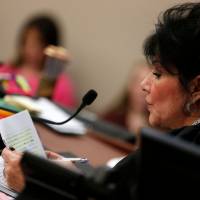 Judge Rosemarie Aquilina reads a letter from former Michigan State University and USA Gymnastics Dr. Larry Nassar during the sentencing phase in Ingham County Circuit Court on Wednesday in Lansing, Michigan. | AFP-JIJI