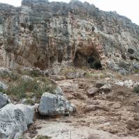 This undated handout photo obtained Thursday shows the Misliya Cave on Mount Carmel in Israel. The oldest remains of a modern human outside Africa have been dug up in Israel, offering evidence of what genetic studies have already suggested &#8212; that humans migrated out of Africa far earlier than previously thought. Facial fragments, including a jawbone and several teeth, were found at a site called Misliya Cave in Israel, one of several prehistoric cave sites located on Mount Carmel. | ROLF QUAM / BINGHAMTON UNIVERSITY / HANDOUT / VIA AFP-JIJI