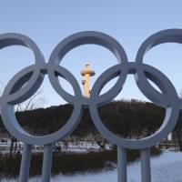 The Olympic rings are displayed at the Main Press Center for the 2018 Pyeongchang Winter Olympics in Pyeongchang, South Korea, Tuesday. Prime Minister Shinzo Abe is planning to attend the opening ceremony, a source in Tokyo said. | AP