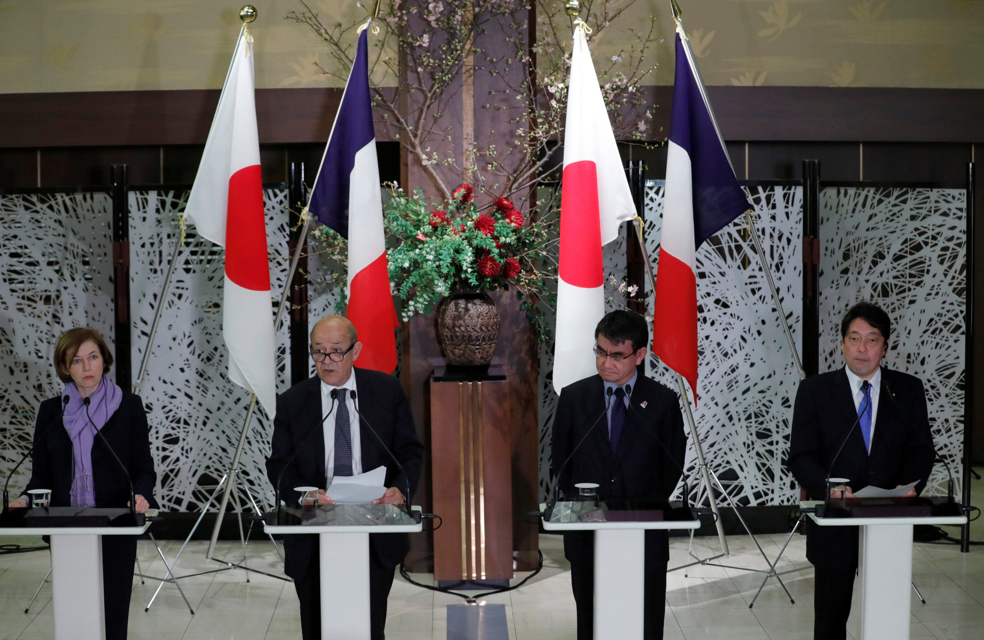 French Defense Minister Florence Parly (left), Foreign Minister Jean-Yves Le Drian (second from left), Japanese Foreign Minister Taro Kono and Defense Minister Itsunori Onodera attend a news conference in Tokyo Friday after their 'two plus two' foreign policy and security talks. | REUTERS
