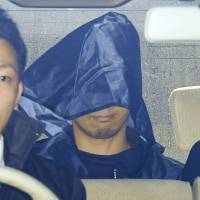 Takashi Miyawaki is sent to the prosecutor Thursday in Kusatsu, Shiga Prefecture. | KYODO