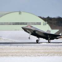 A next-generation F-35A stealth jet arrives at Misawa Air Base in Aomori Prefecture on Friday. | KYODO