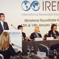 Foreign Minister Taro Kono speaks during a meeting of the International Renewable Energy Agency (IRENA) on Sunday in Abu Dhabi. | KYODO