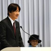 Prince Akishino delivers a speech beside Princess Akishino during a ceremony to honor Japan\'s Winter Olympics team in Tokyo on Wednesday | AFP-JIJI
