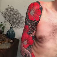 Two examples of Gakkin\'s freehand tattoo work, in which black dominates and red offers striking contrast. | GAKKIN