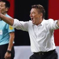 Former Urawa Reds manager Mihailo Petrovic, seen leading the team  against Consadole Sapporo in July, is the new Sapporo boss. | KYODO