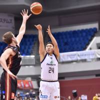 Ryukyu forward Naoki Tashiro takes a shot in the second quarter on Friday night. | B. LEAGUE