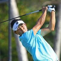 Daisuke Kataoka plays a shot at the Sony Open on Friday in Honolulu. | KYODO