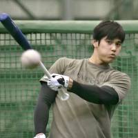 Shohei Ohtani works out on Friday in preparation for the upcoming season. | KYODO