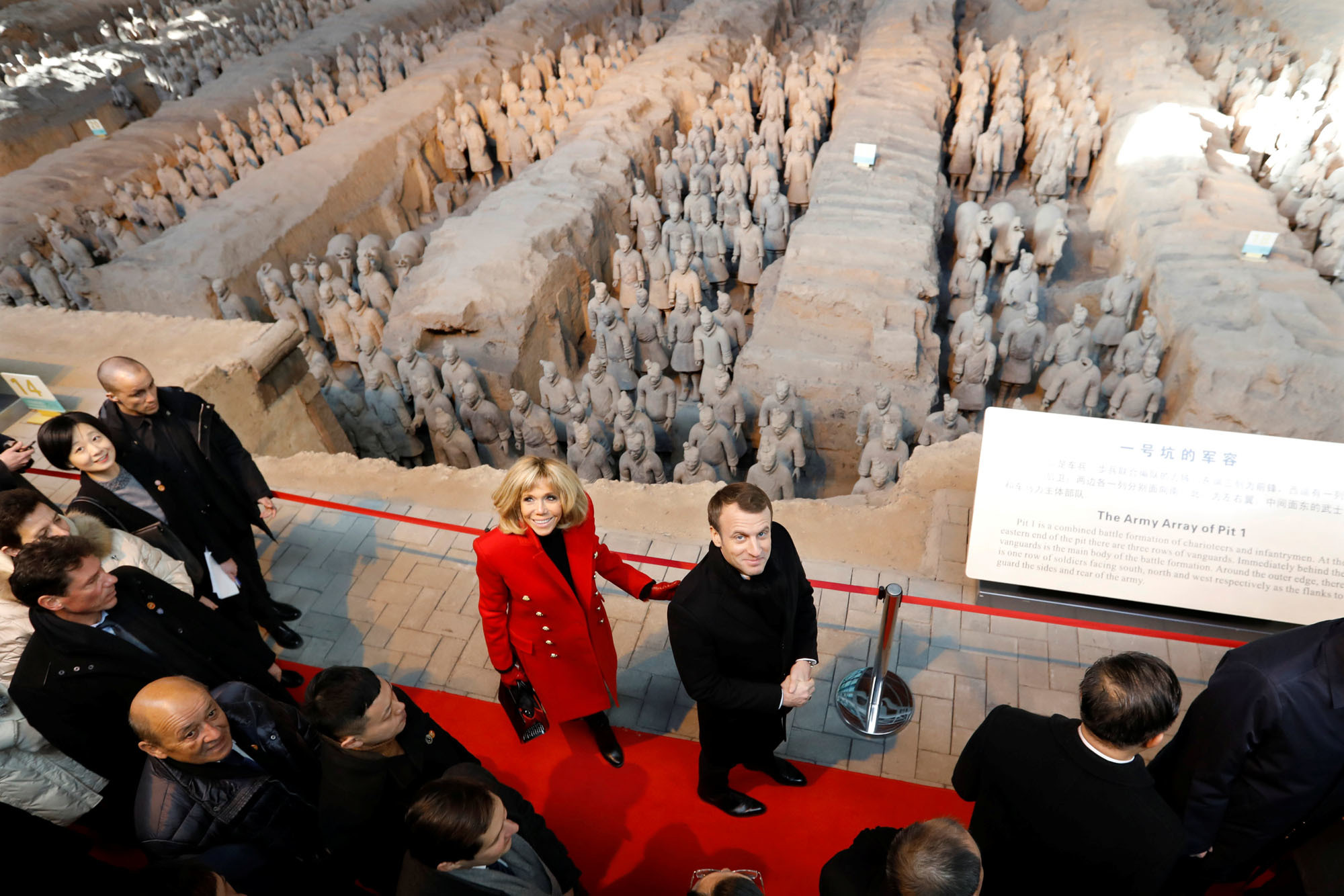 French President Emmanuel Macron and his wife, Brigitte, visit a museum in Xi'an, China, on Monday. On the first day of his three-day trip to China Macron went out of his way to win the heart of Chinese President Xi Jinping, offering him a horse of the elite French Republican Guard. Macron selected an 8-year-old brown gelding named Vesuvius, and braved stringent Chinese quarantine checks to offer it to Xi. | REUTERS