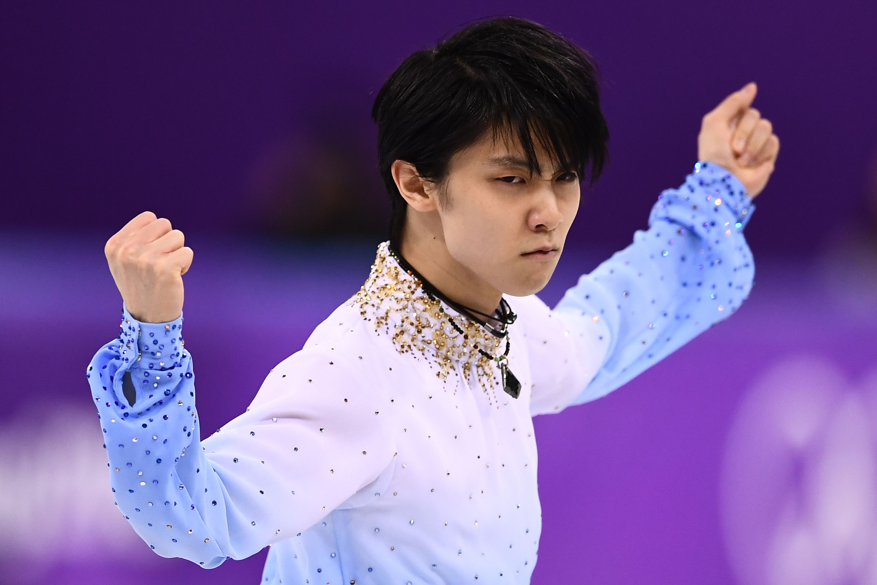 Yuzuru Hanyu strikes a pose in the men's single skating short program of the figure skating event. | AFP-JIJI